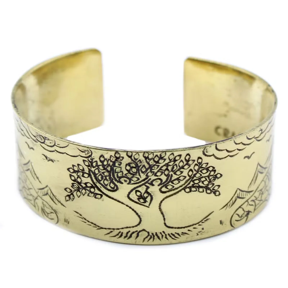 Brass spiritual bracelet featuring a Tibetan mantra and Tree of Life design on a textured band