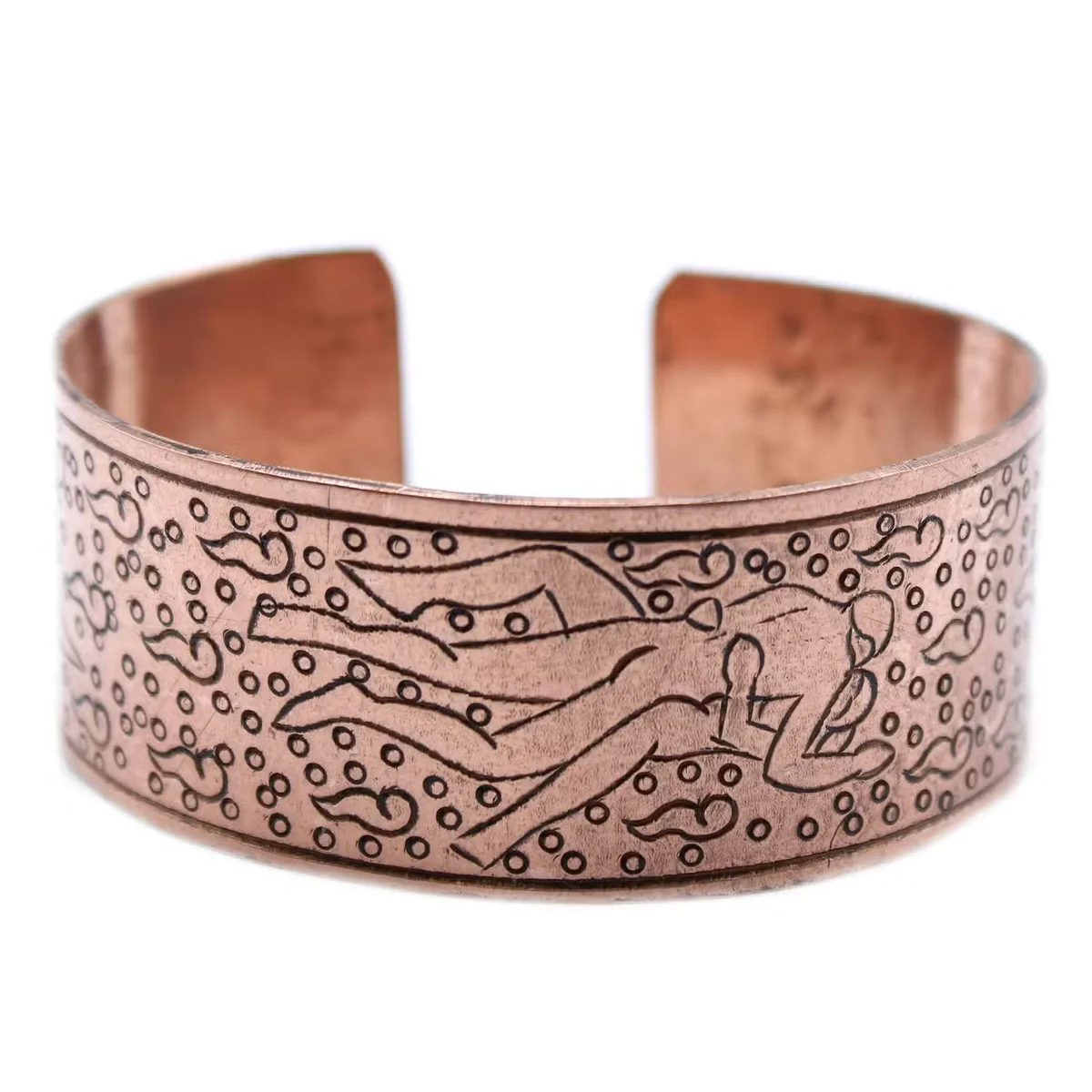 Unique copper bracelet with intricate Tibetan Kamasutra design, handcrafted and polished for a distinctive look