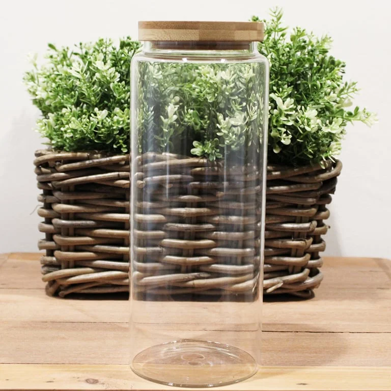 Cottage bamboo glass jar (25 cm) showcasing a bamboo lid jar with clear bottle and wooden base.