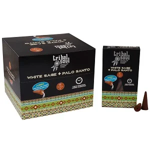 Tribal Soul backflow incense cones in white sage and palo santo scent, arranged on a wooden holder with smoke flowing down