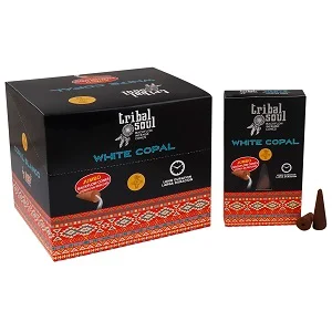 Tribal Soul incense cones in white copal scent arranged on a decorative holder with smoke flowing downwards