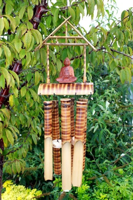 Bamboo 6 tube holder with a meditation buddha statue in a natural finish, ideal for home decor and relaxation spaces