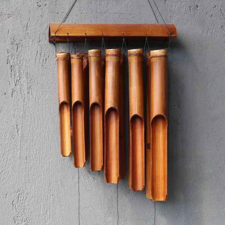 Bamboo windchime with 12 large tubes in natural finish hanging against a white background