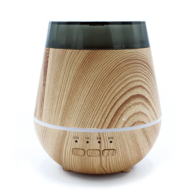 USB atomiser diffuser in a minimal capsule, colour change LED lights, timer ring on top, Helsinki brand.
