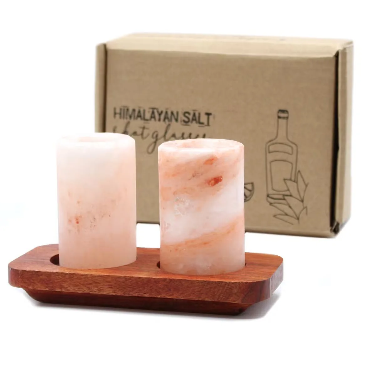 Two unique shot glasses made from Himalayan salt on a wooden serving stand against a white background