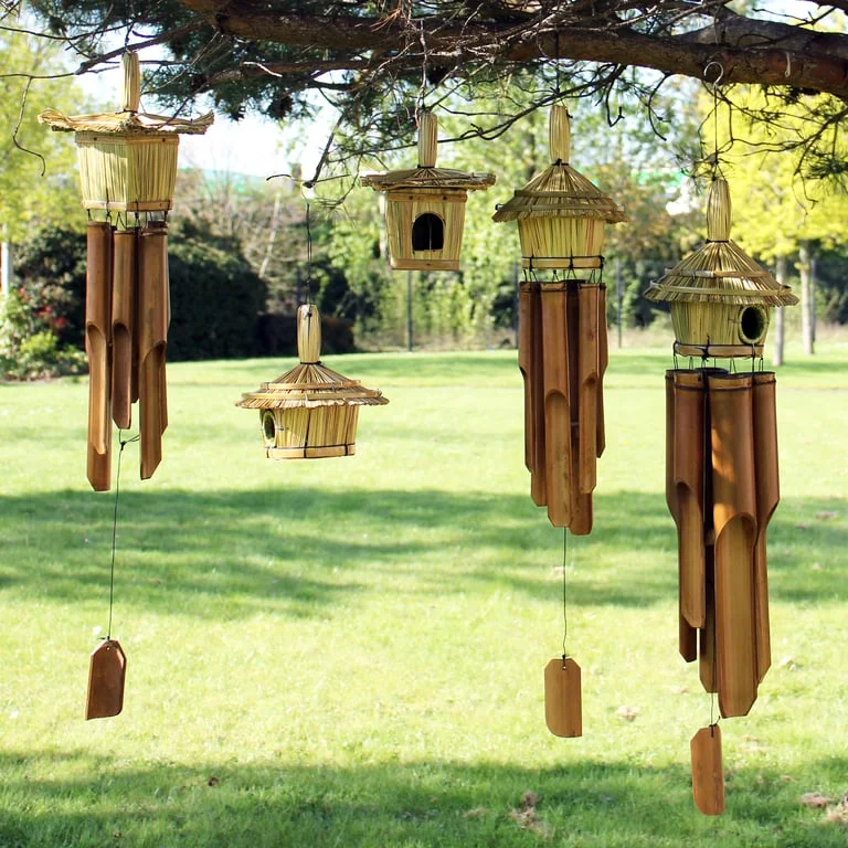 Large round seagrass bird box with chimes hanging, measuring 56x20cm, designed as a large bird box for outdoor use