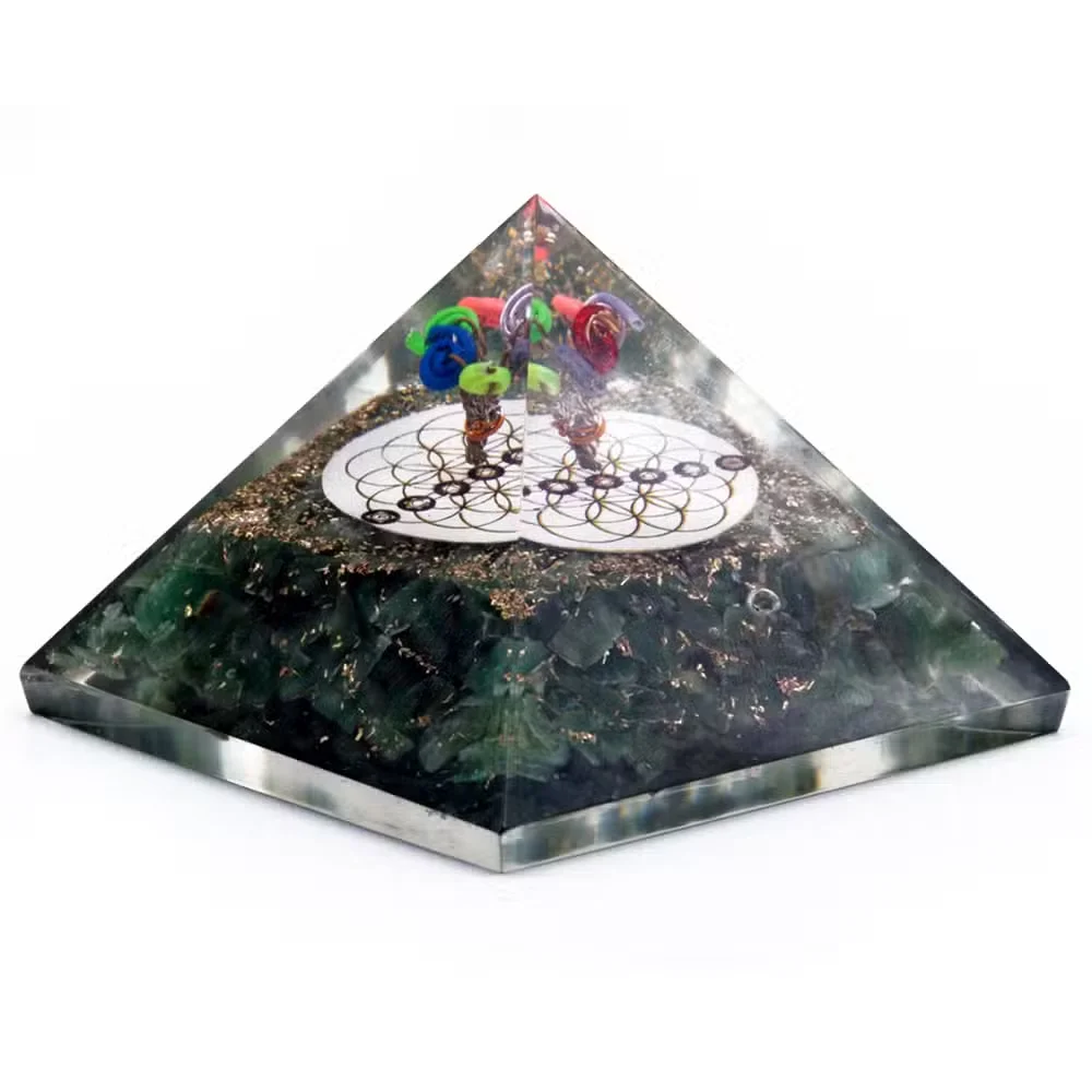 Green aventurine orgonite pyramid with Flower of Life design, 70 mm orgonite decor on white background