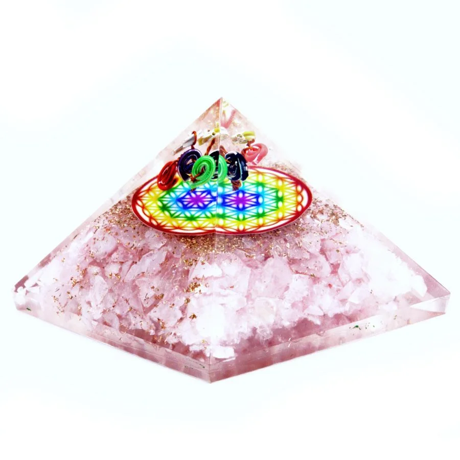 Orgonite pyramid rose quartz with rainbow Flower of Life design, 70 mm size, showing translucent pink crystal structure