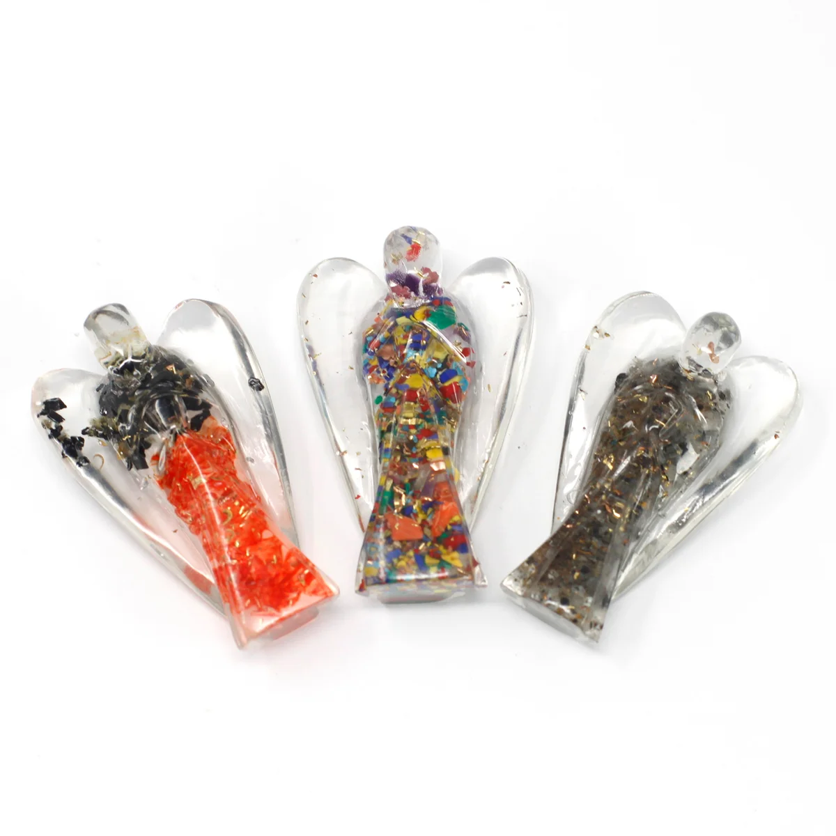 50mm Orgonite Angel with gemchips and copper details, copper orgonite decoration on white background