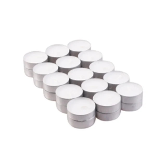 Thirty unscented tealights bulk pack showing small white candles in metal holders arranged closely together