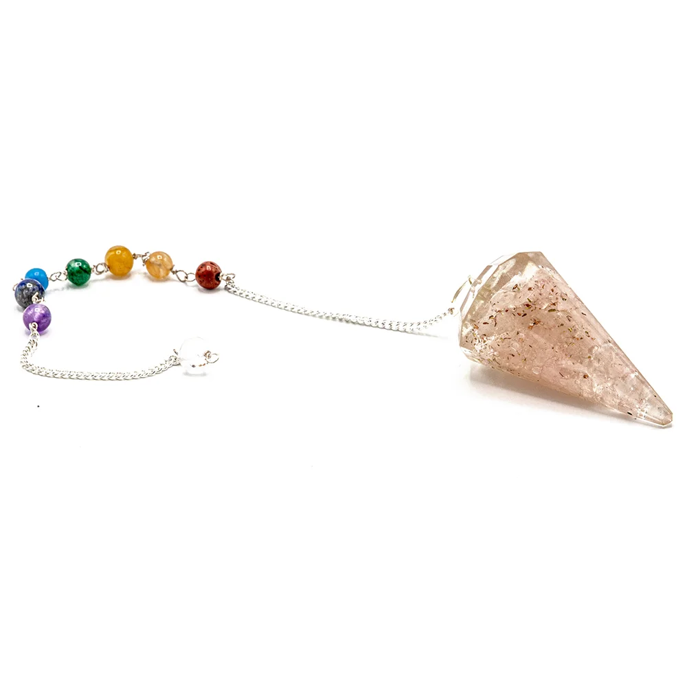 Orgonite power chakra healing pendulum made with rose quartz crystal on a chain against white background