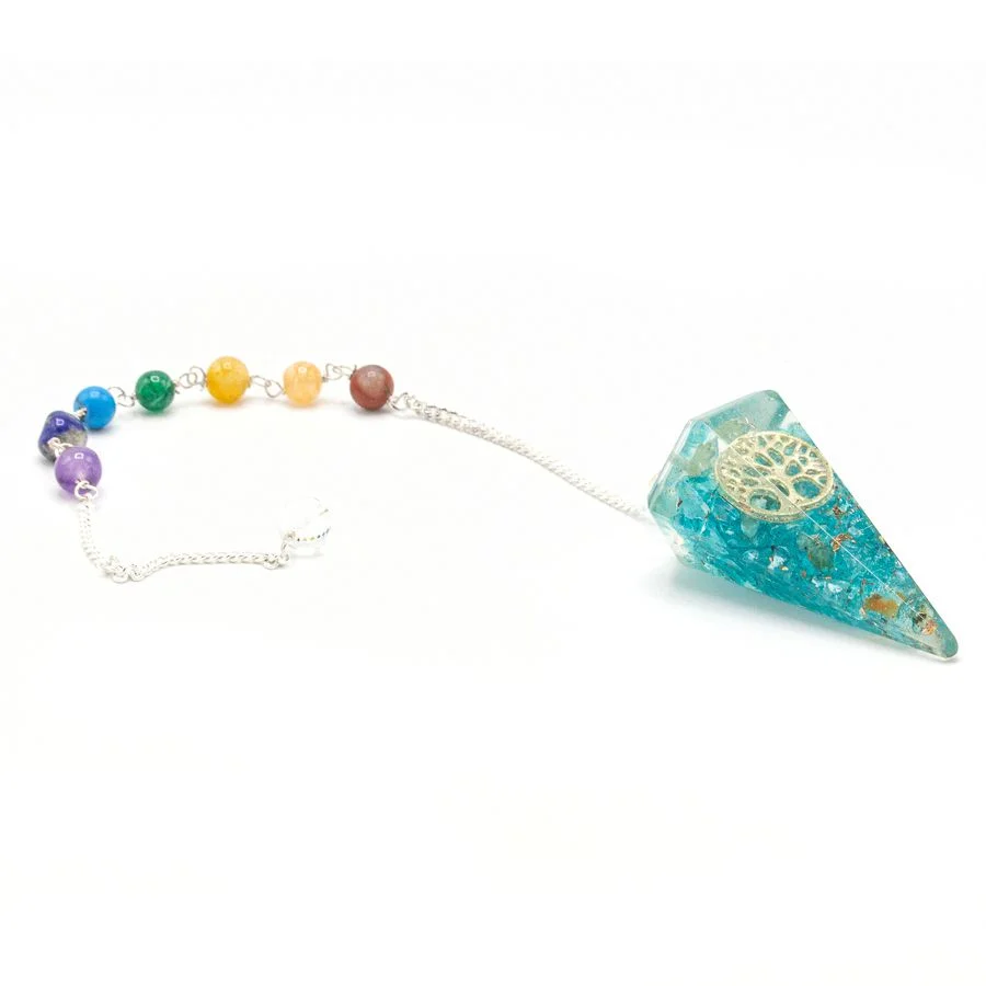 Orgonite chakra pendulum featuring a Tree of Life design with colorful chakra stones embedded in the orgonite resin
