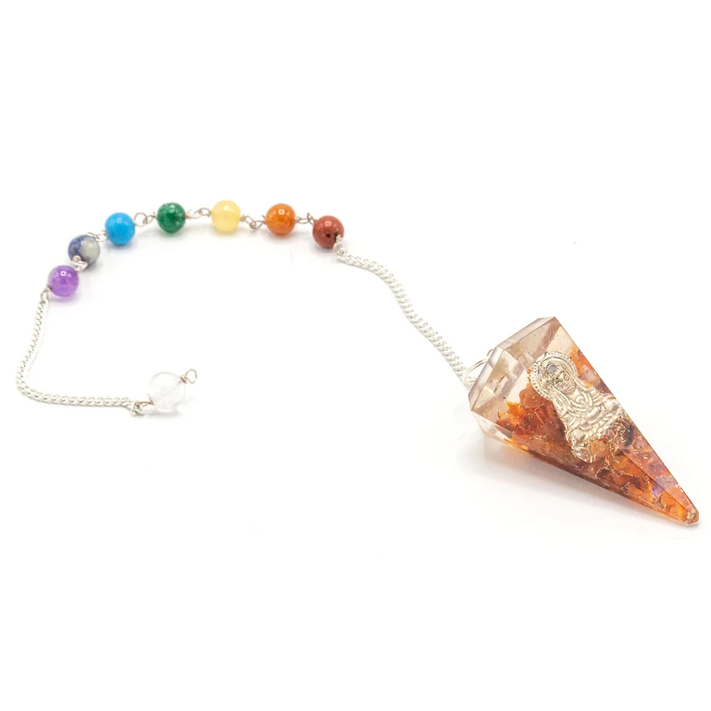 Orgonite power pendulum featuring a Buddha design with chakra elements on a white background