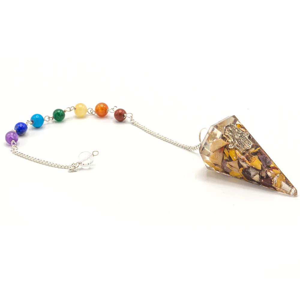 Orgonite power chakra hamsa pendulum ornament with colorful chakra stones and silver chain on white background