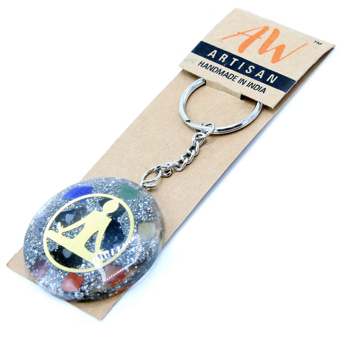Orgonite power keyring featuring a Buddha figure with seven colorful chakra symbols on a metal ring