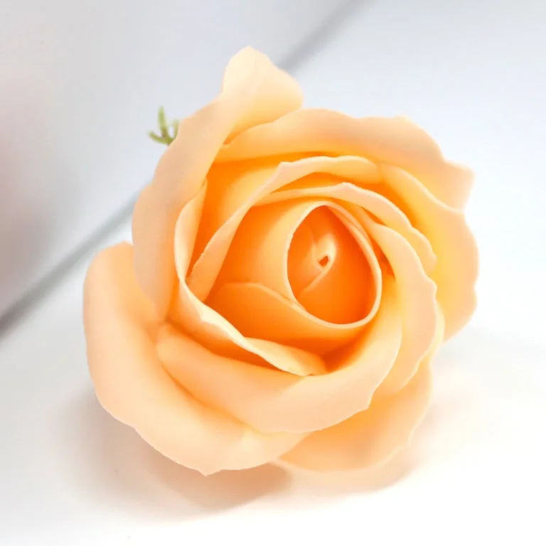 Peach-colored medium rose shape craft soap flower in a bouquet arrangement, showcasing delicate craft soap flowers