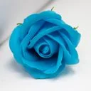 Handmade royal blue medium rose craft soap flowers displayed on a flat surface.