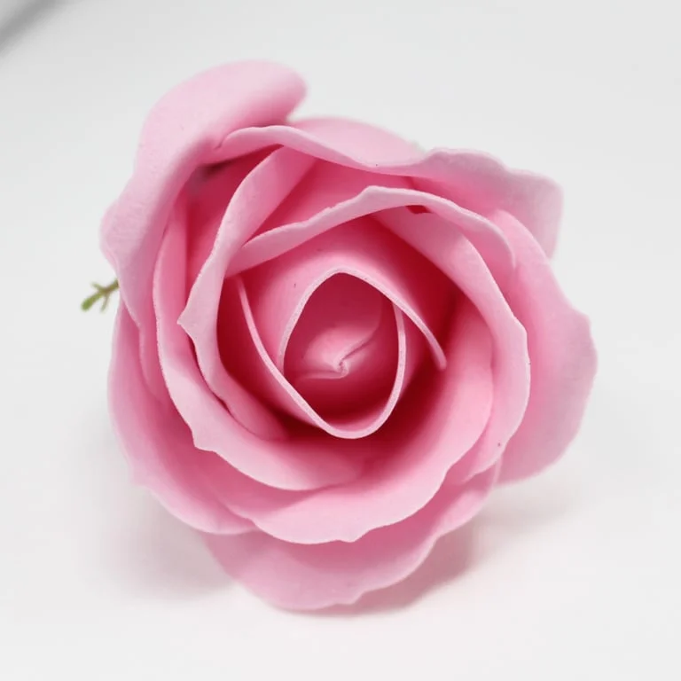 Craft soap flowers shaped as a medium rose in blush color.