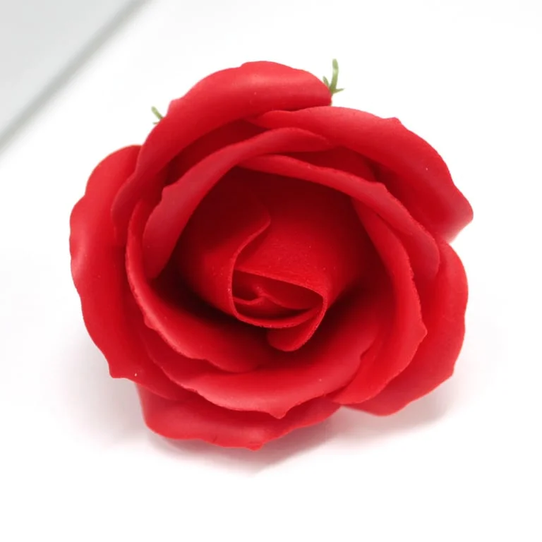 A stack of medium‑size red craft soap flowers arranged like a rose.