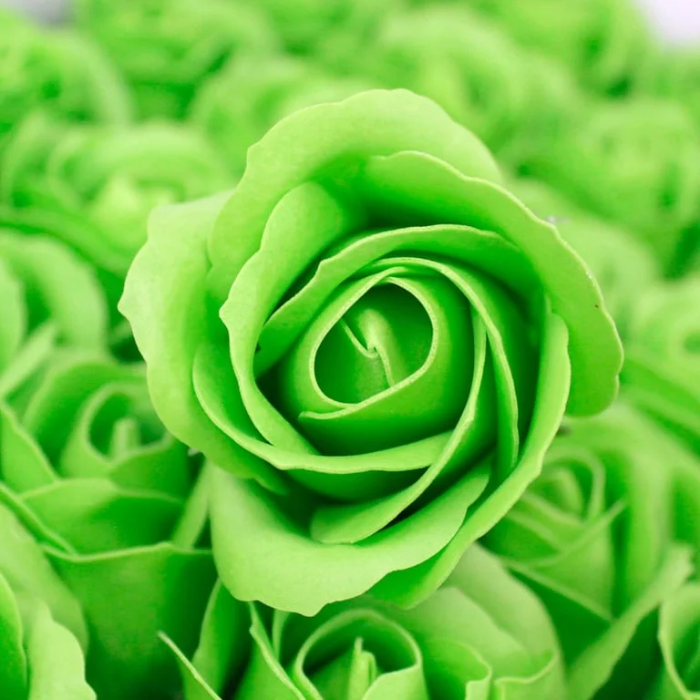 Green craft soap flower shaped like a medium rose, a med rose soap