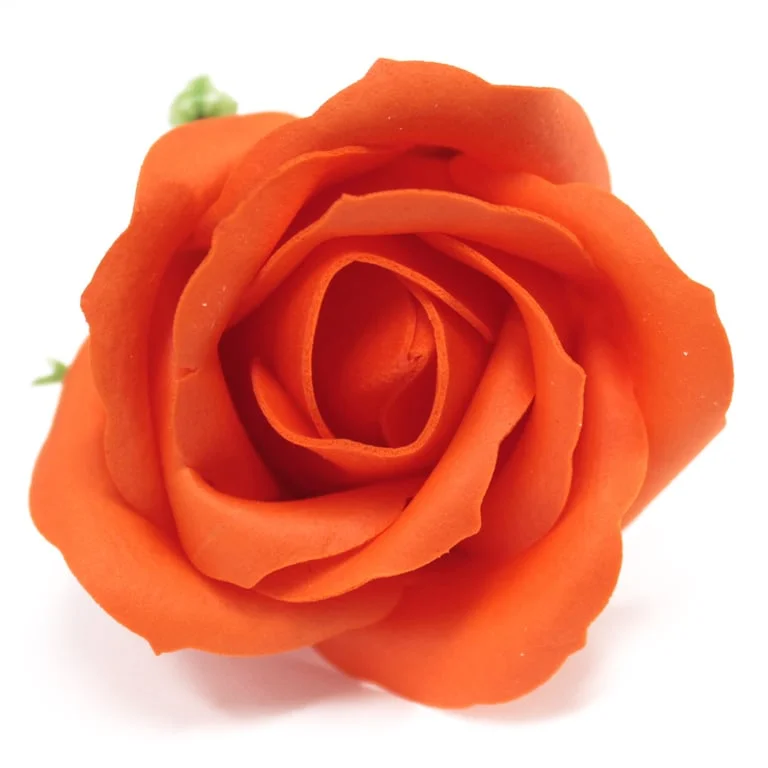 Sunset orange craft soap flowers arranged to form a medium rose.