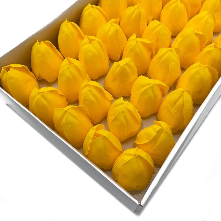 Craft soap flower shaped like a medium yellow tulip.