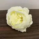 Ivory soap flower crafted as an extended peony, a soft and detailed floral design.