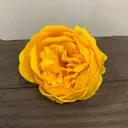 Yellow large peony soap shaped like a flower.