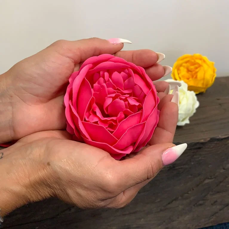 Large soap flower shaped like a vibrant pink peony rose.
