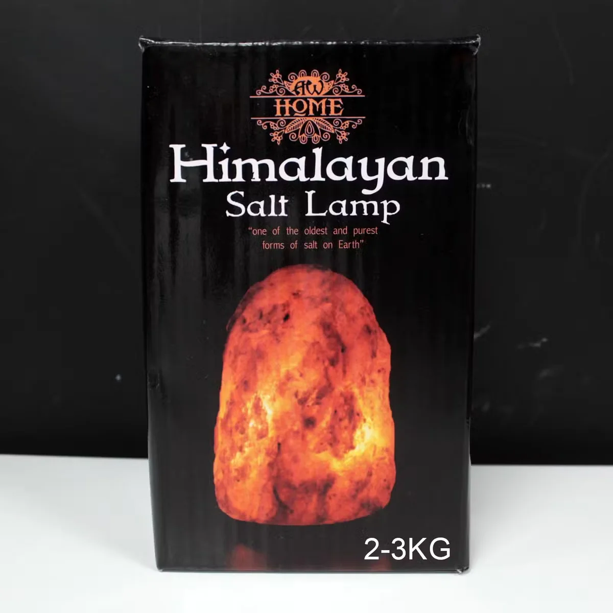 Natural salt lamp on its salt lamp base, weighs 2-3kg.
