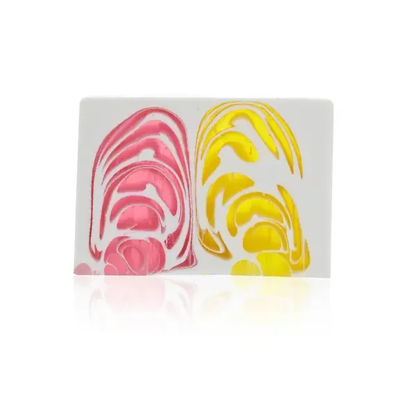 Handcrafted orchid soap slice 100g with smooth texture and delicate floral design on a white background