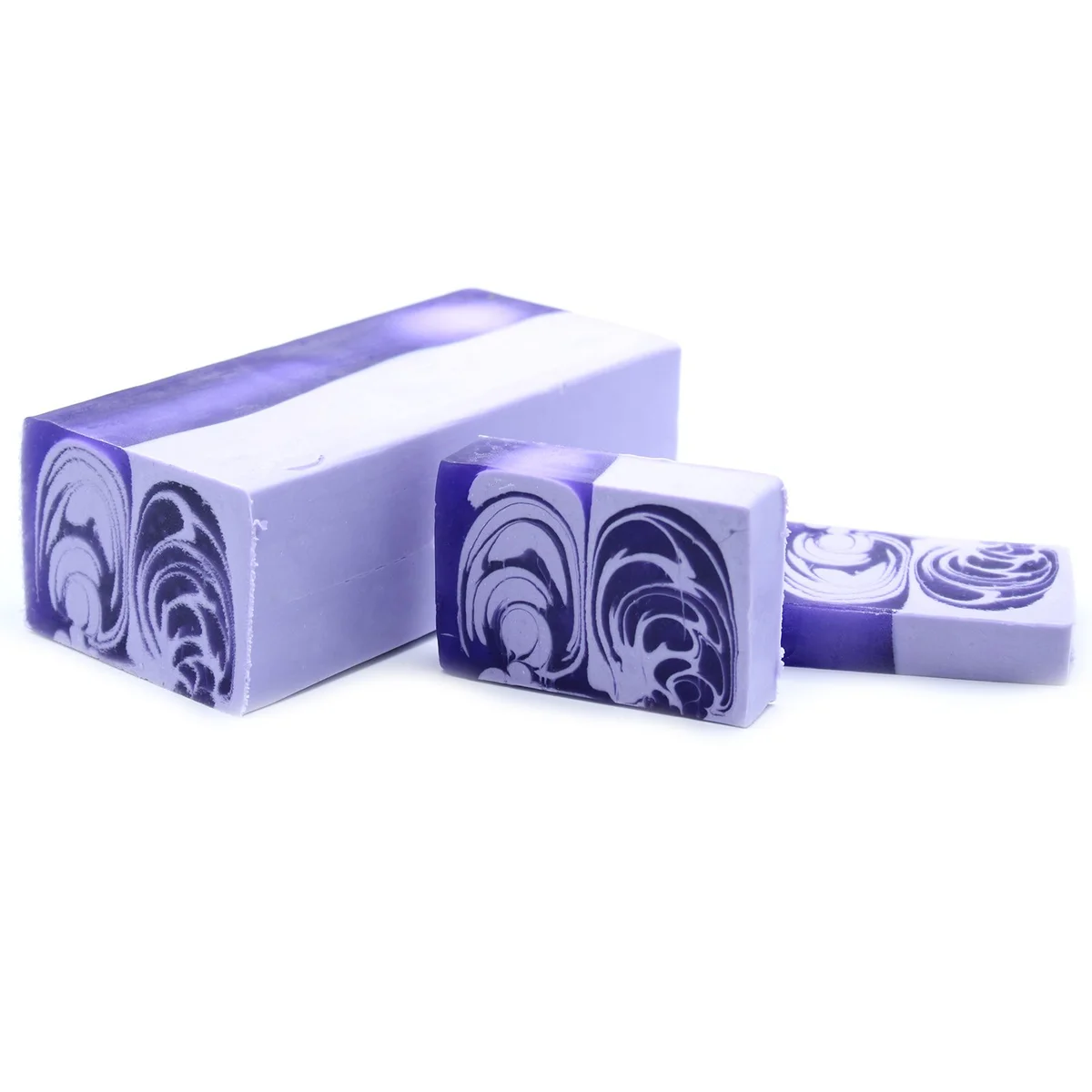 Handcrafted soap loaf in lilac scent, 1.2kg, rectangular block with smooth textured surface on white background