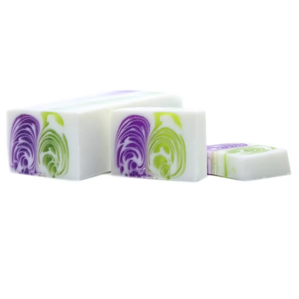 Large handcrafted soap block weighing 1.2kg in Dewberry scent with smooth texture on a white background