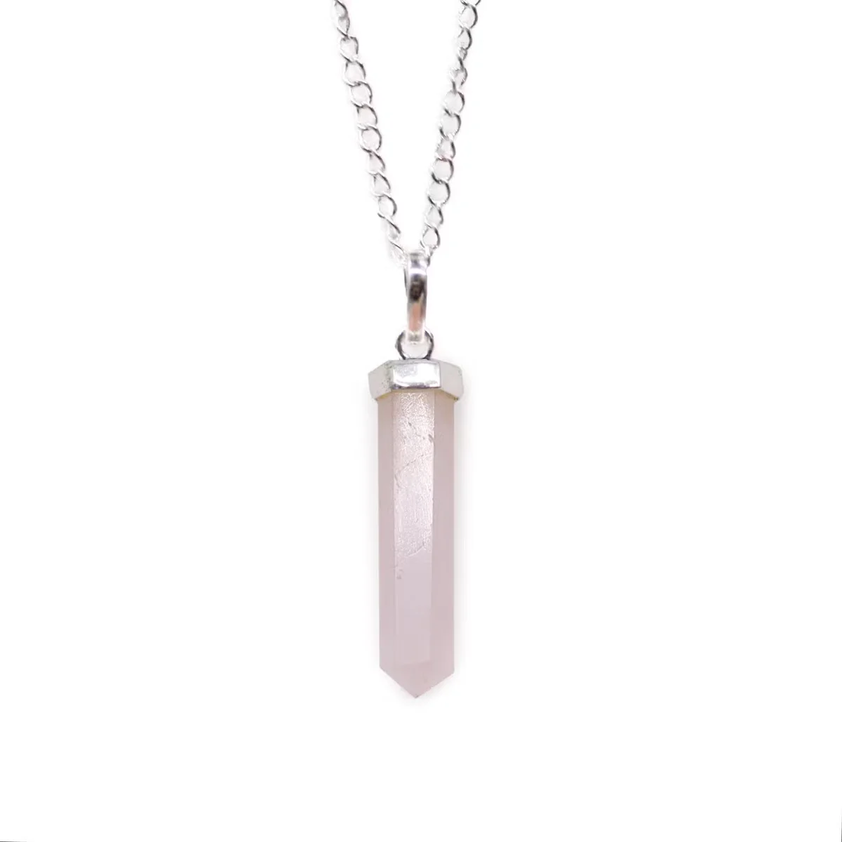 Rose quartz classic point pendant on a silver chain, showcasing elegant rose quartz jewellery design