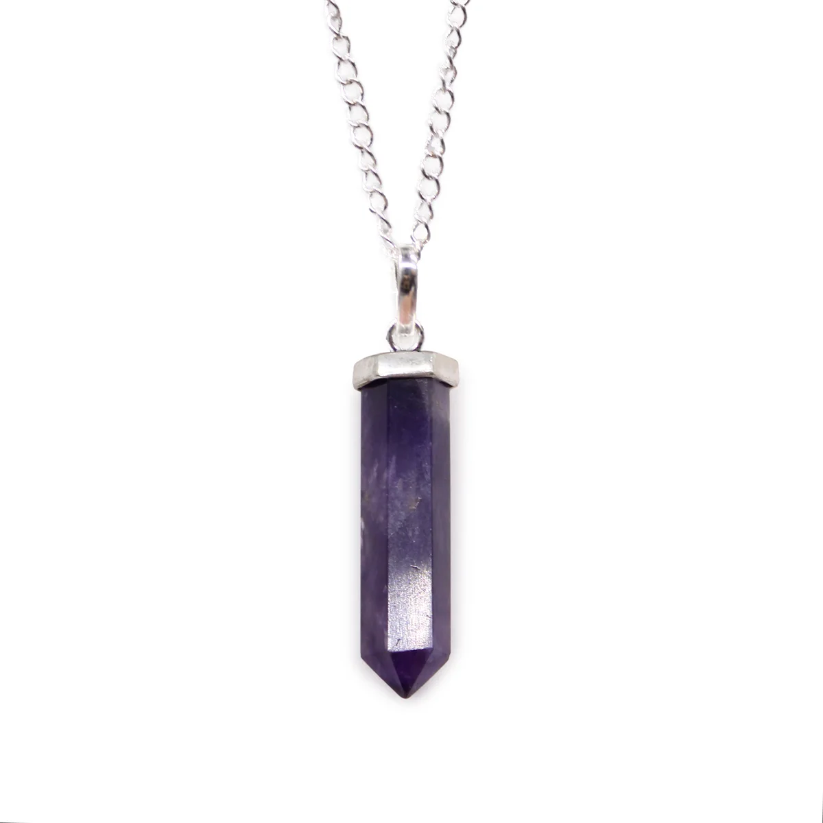 Classic point pendant featuring a polished purple amethyst gemstone on a silver chain against a white background