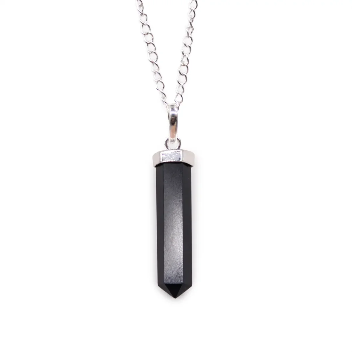 Black agate gemstone point pendant with silver setting on white background