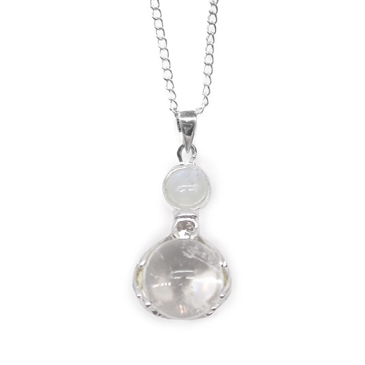Healing hands necklace featuring a rock quartz gemstone pendant on a silver chain against a white background