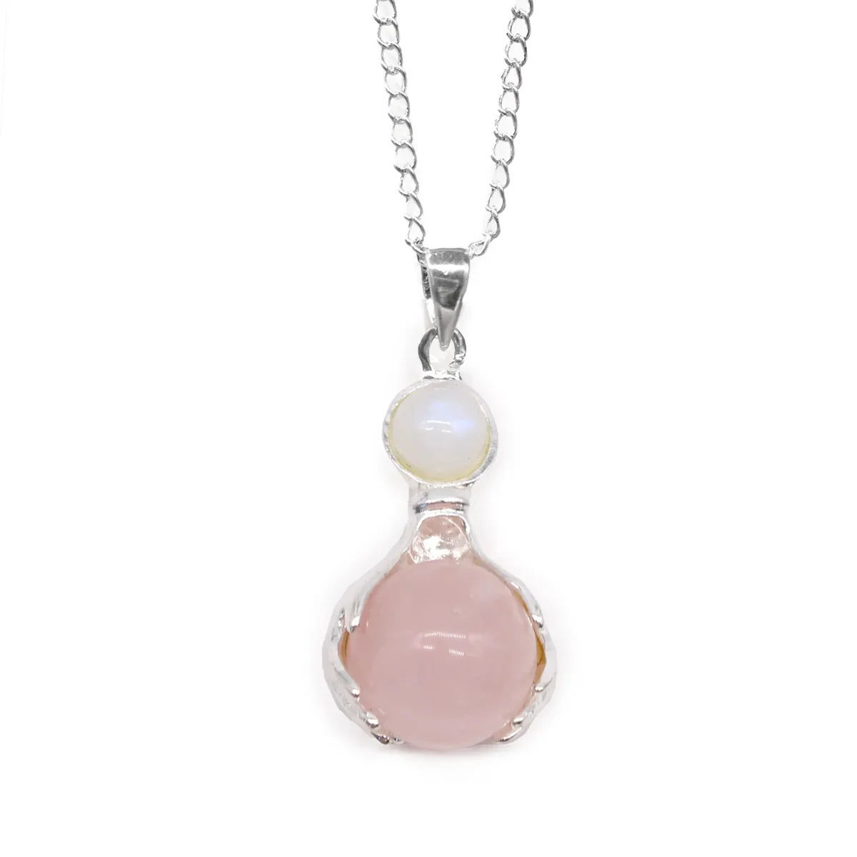 Rose quartz gemstone healing pendant shaped like two hands holding a polished pink stone on a silver chain