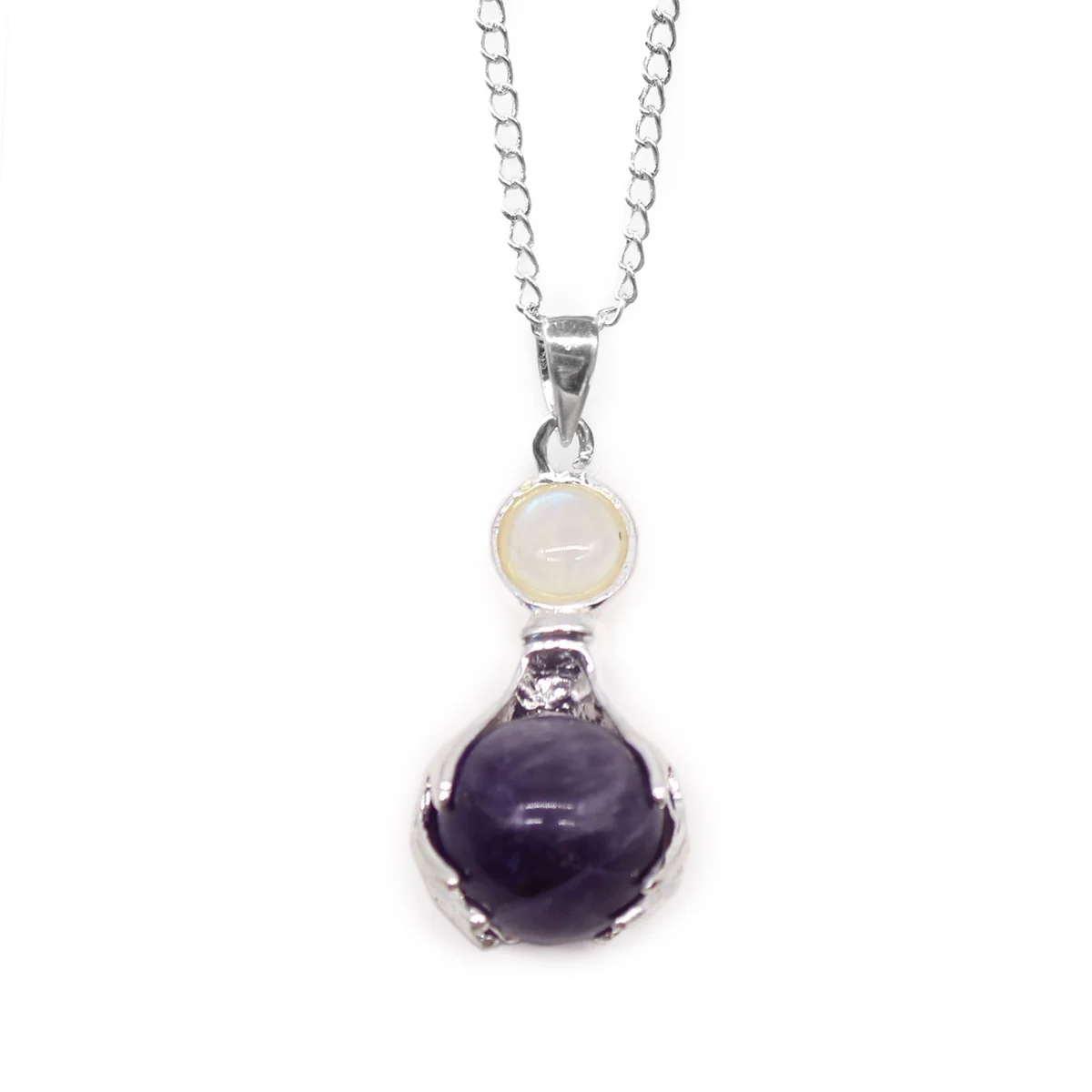 Amethyst pendant necklace featuring gemstone healing hands design on a silver chain against white background