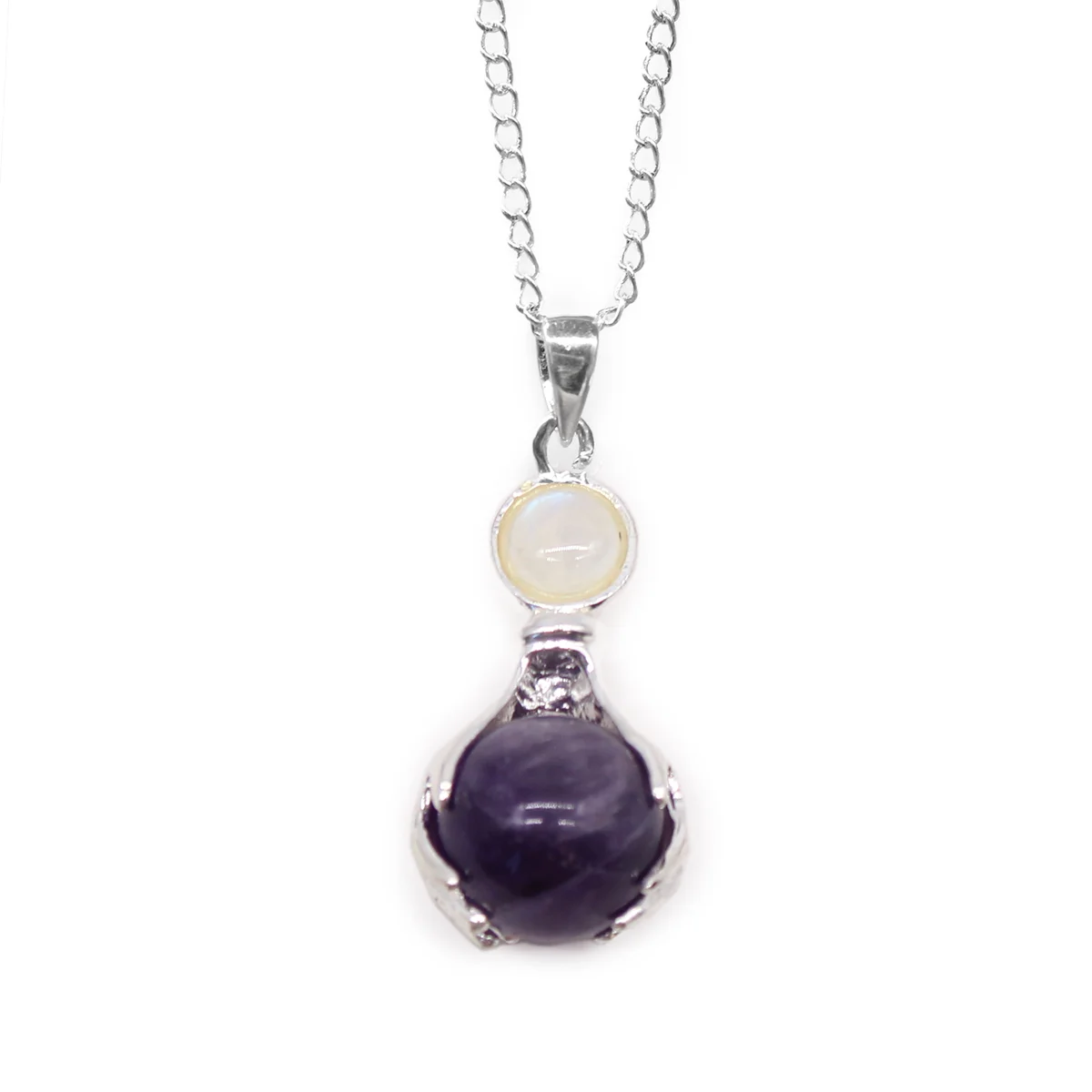Healing hands necklace pendant featuring a polished purple amethyst gemstone on a silver chain
