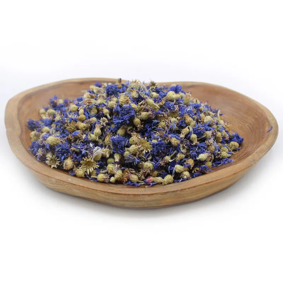 Close-up of vibrant blue edible flowers, whole cornflowers in a 0.5kg pack on a white background