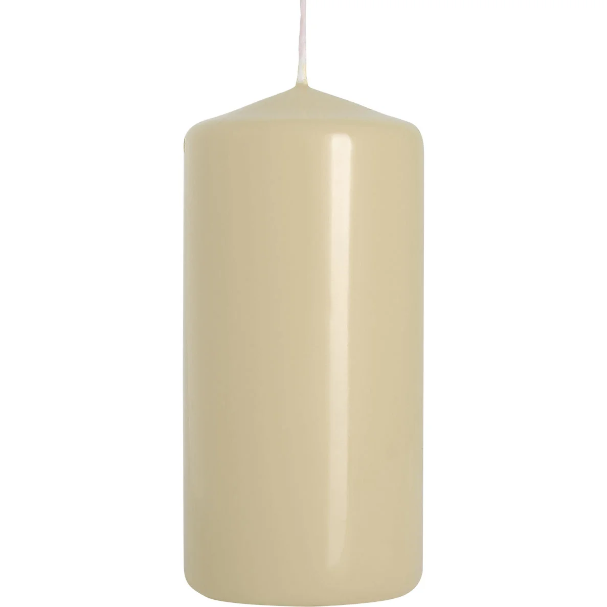 Ivory decorative candle pillar shape measuring 50x100mm on plain white background