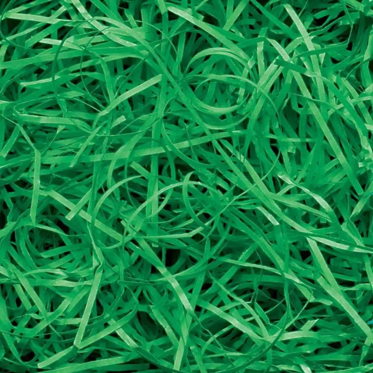 Green very fine shredded paper used as gift box filler in a clear pile weighing 0.5KG
