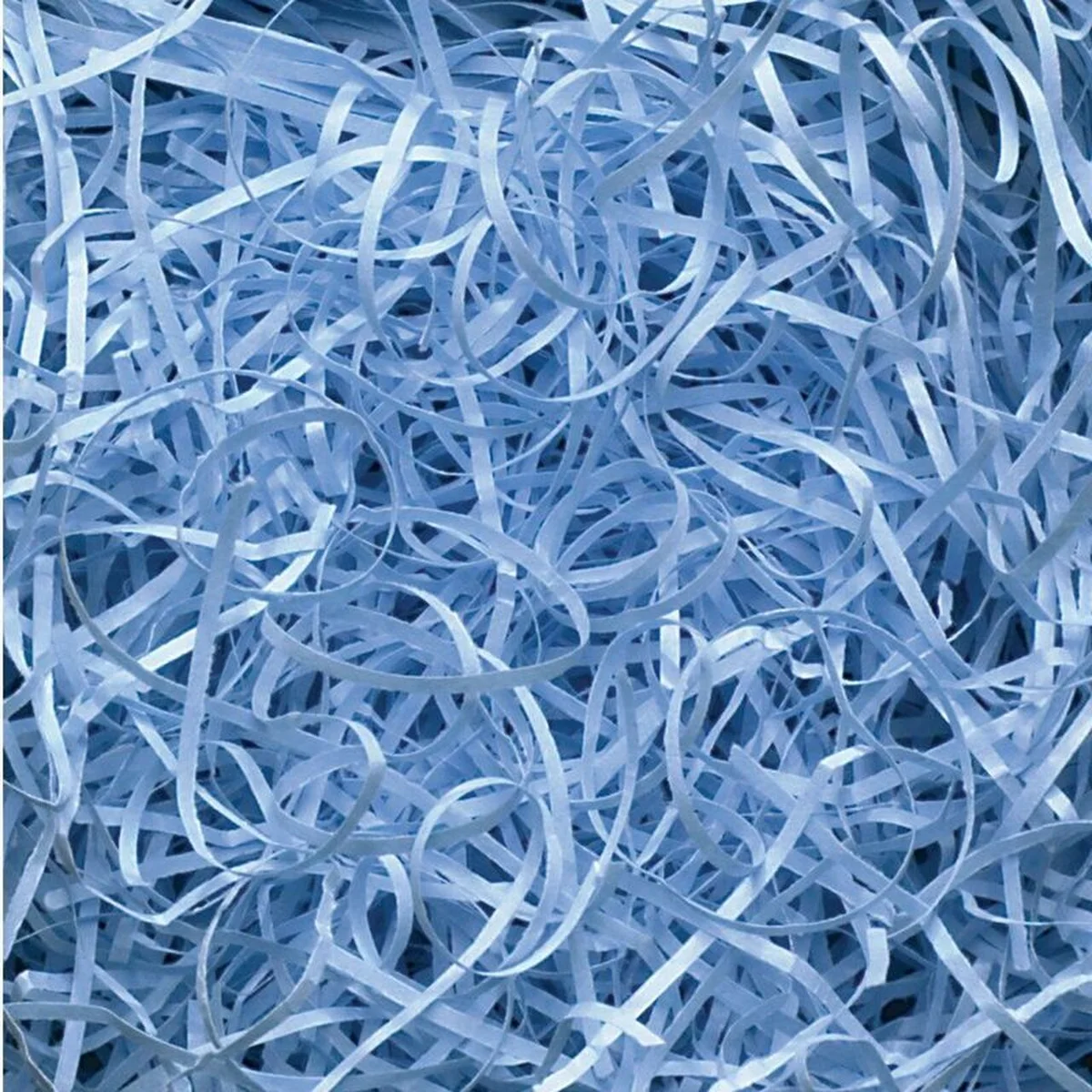 Pile of sky blue fine shredded paper weighing 0.5KG for crafting or packing purposes