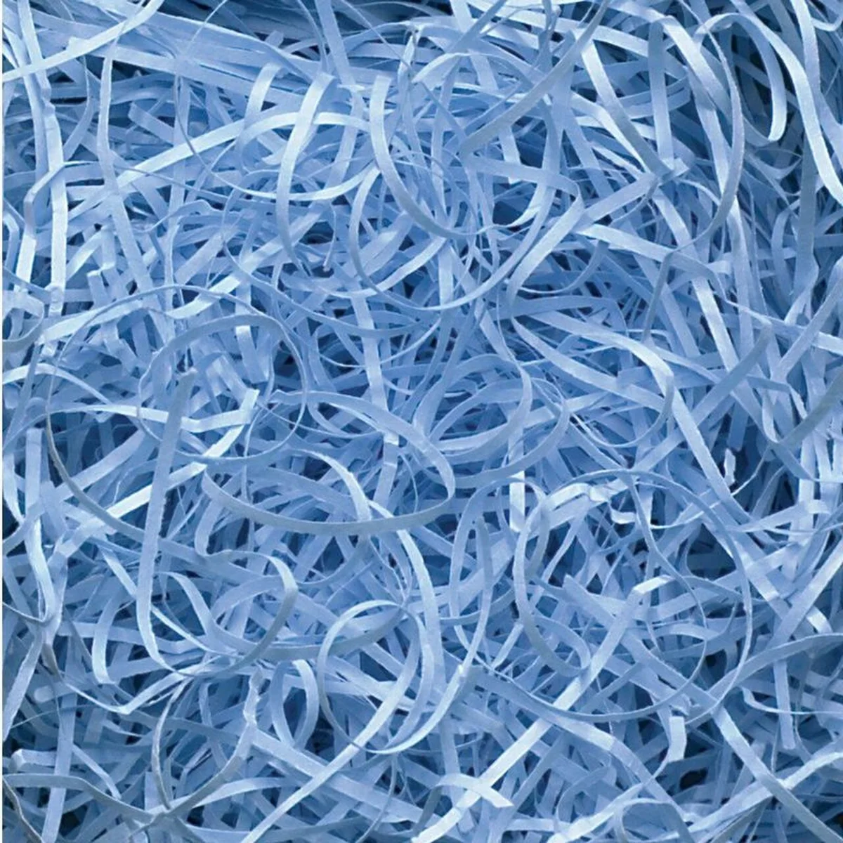 Close-up of sky blue decorative shredded paper in a pile, very fine texture, 0.5KG pack