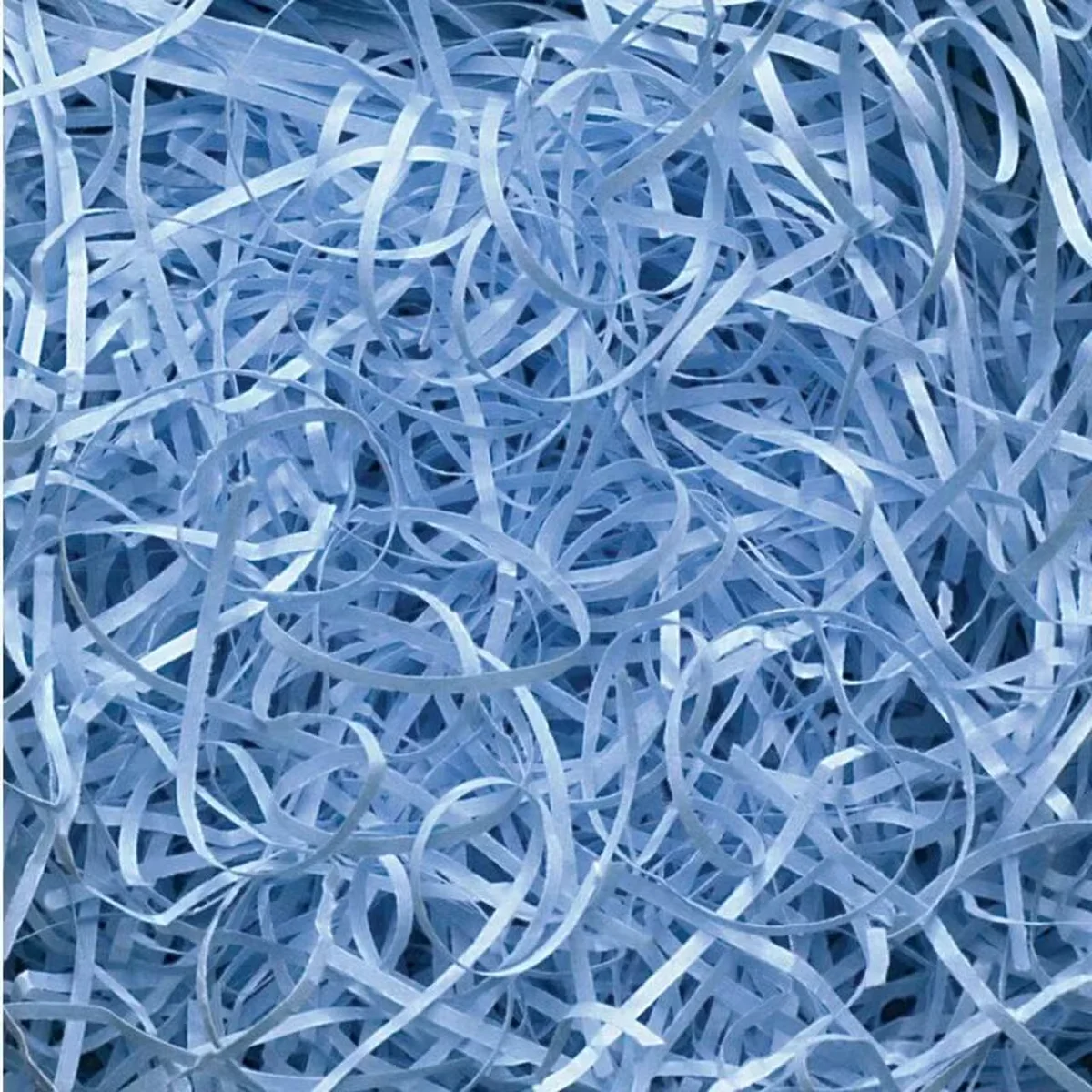 Close-up of sky blue shredded paper 0.5kg showing fine texture and color consistency