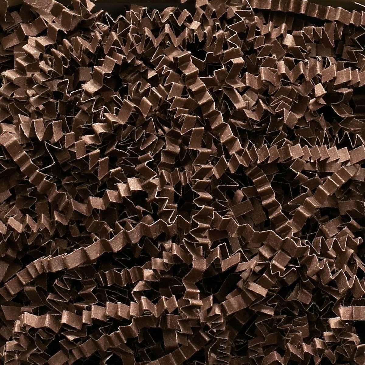 Chocolate brown shredded paper used as gift box filler in a clear container, 1KG pack of SizzlePak brand