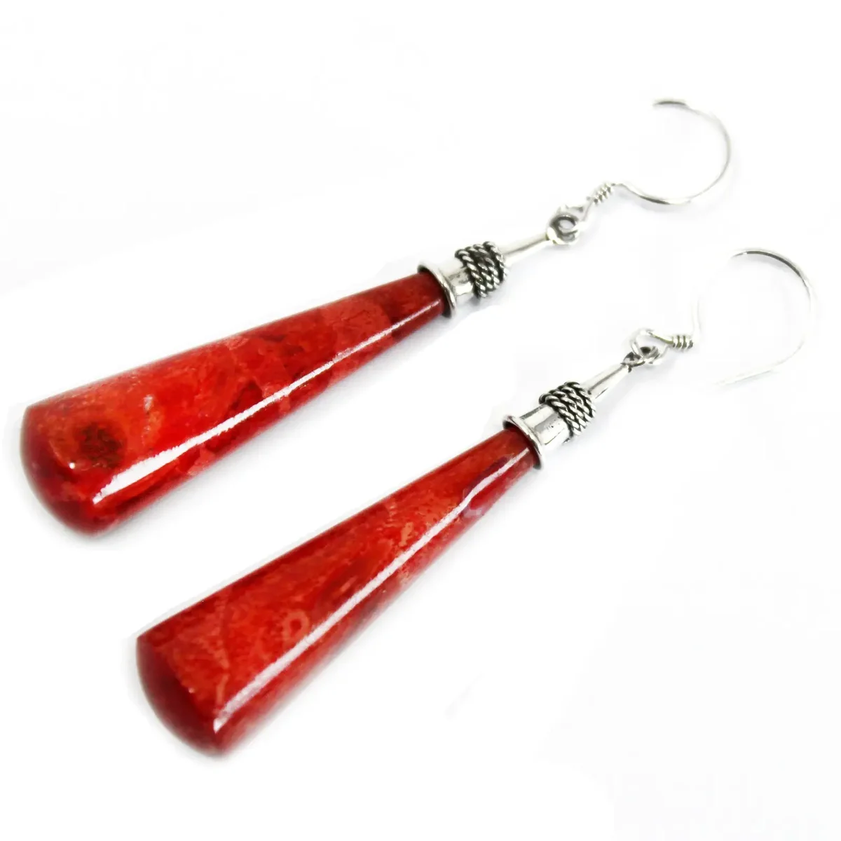 925 silver long teardrop earrings on display.