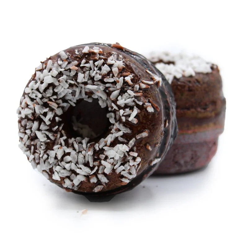 Chocolate coconut bath bomb donut, frosted white glaze, text: 'Chocolate & Coconut