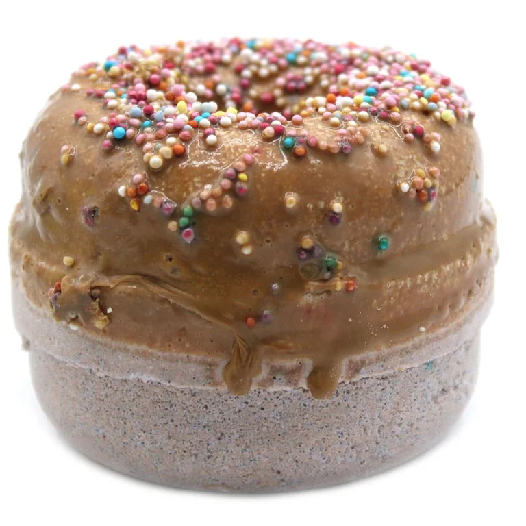 Toffee and caramel bath donuts, bath bombs for relaxation, arranged in a decorative display.